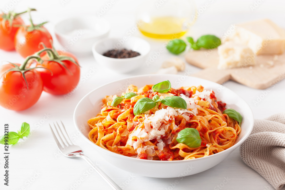 tagliatelle pasta with tomato sauce parmesan basil