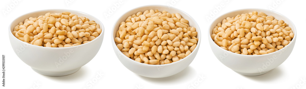 Pine nuts in bowls isolated on white background. Set for package design
