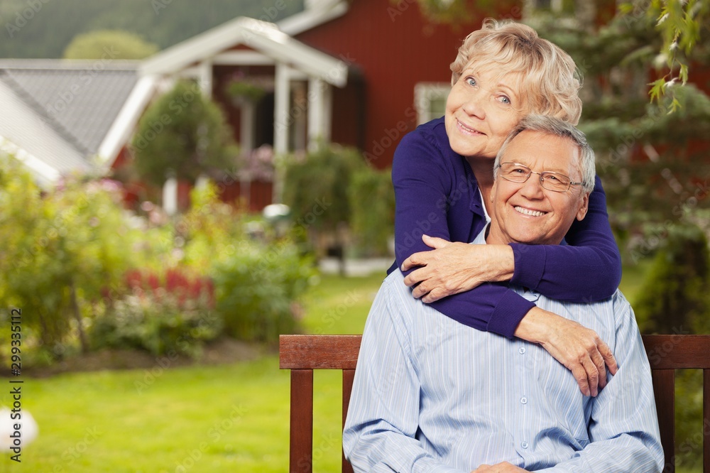 Portrait of happy senior couple smiling at home Portrait of happy senior couple smiling at home