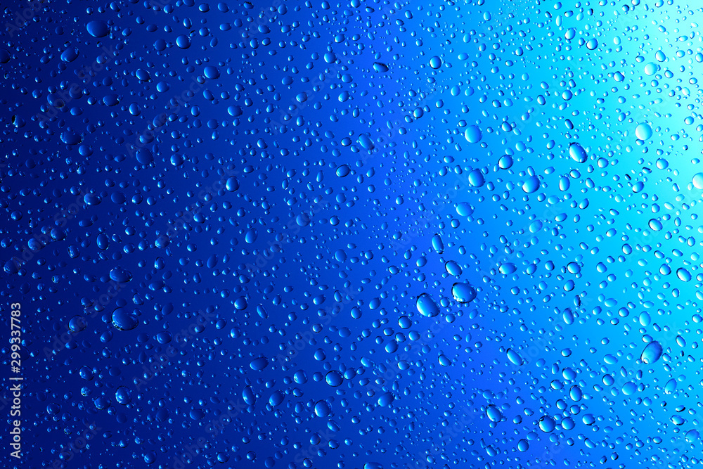 Sparkling water droplets on translucent blue - obrazy, fototapety, plakaty 