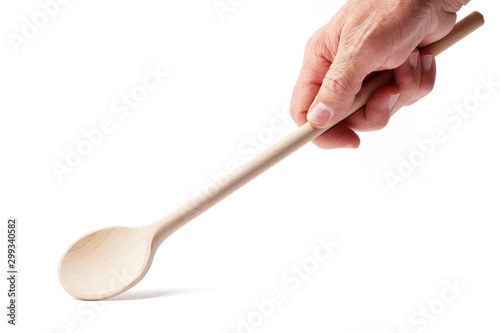 Hand with a Wooden Cooking Spoon on White