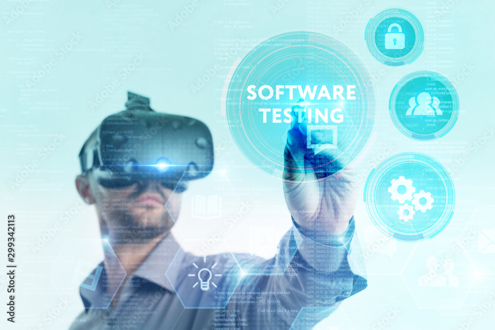 Business, Technology, Internet and network concept. Young businessman working on a virtual screen of the future and sees the inscription: Business, Technology, Internet and network concept. Young businessman working on a virtual screen of the future and sees the inscription: