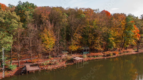 Fototapeta Naklejka Na Ścianę i Meble -  Aerial top view. Autumn landscape. Lake in autumn forest