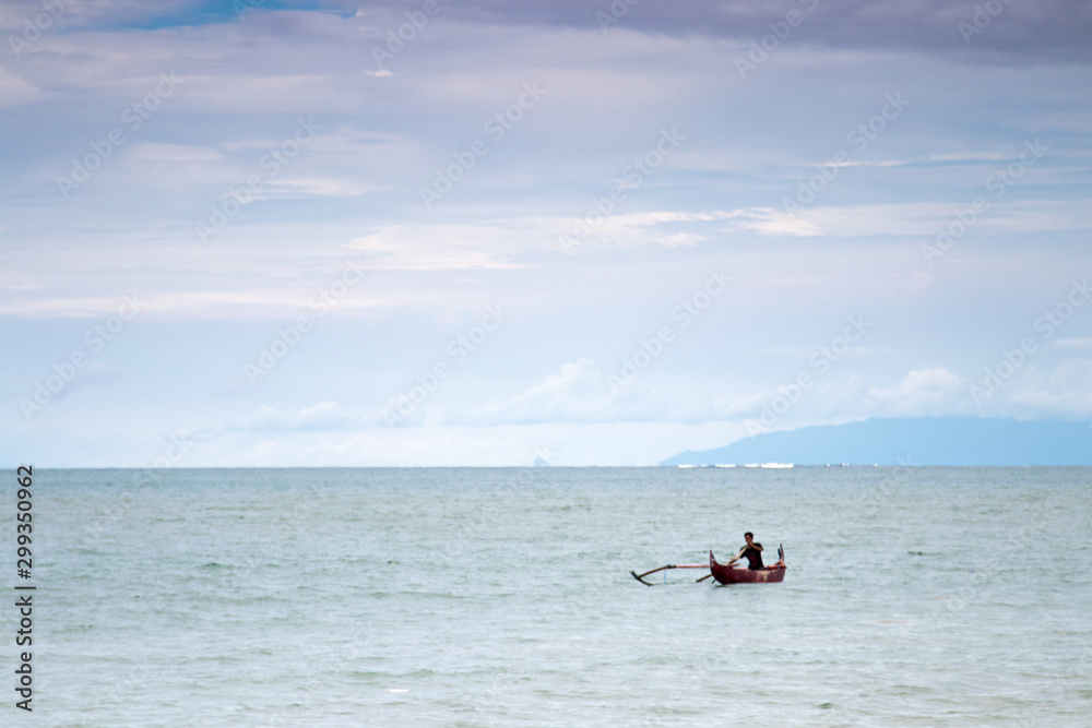 Naklejka premium paradise on earth, the best place for relaxing, tropical beach, relax in the tropics on the beach near the sea. Indonesia, Bali island. Relax and vacation, travel