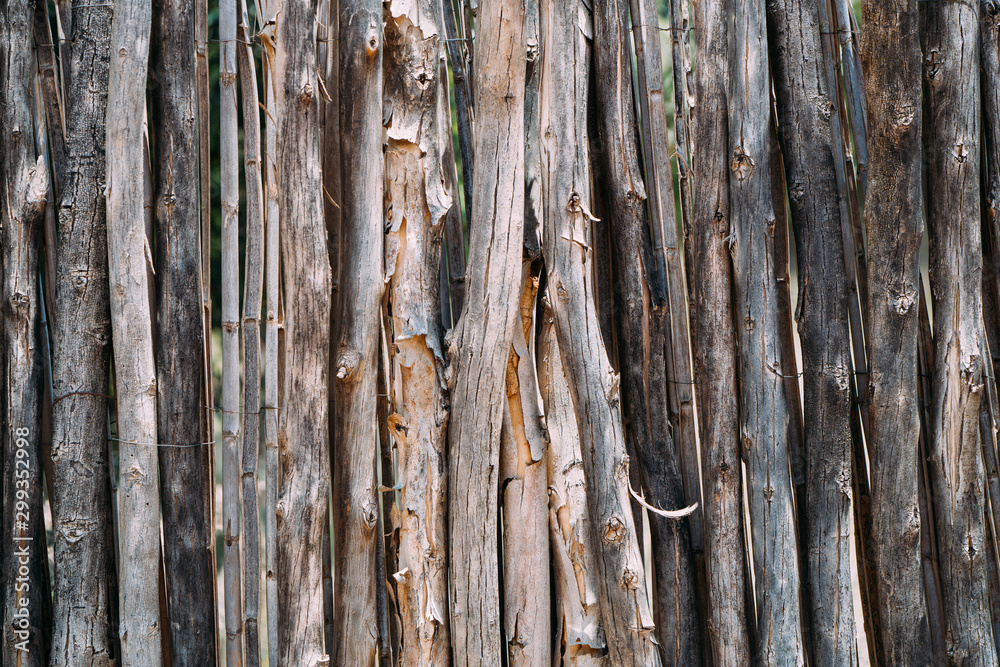 Wooden fence with weathered wood that can be used as background Wooden fence with weathered wood that can be used as background