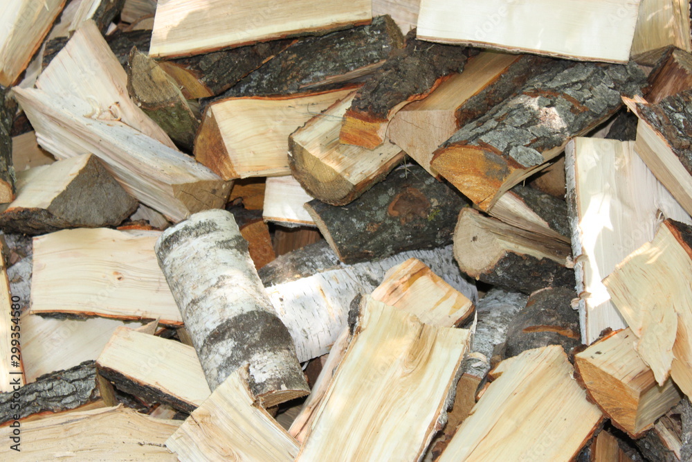 Texture of sawn wooden planks, bars in a chaotic position Texture of sawn wooden planks, bars in a chaotic position