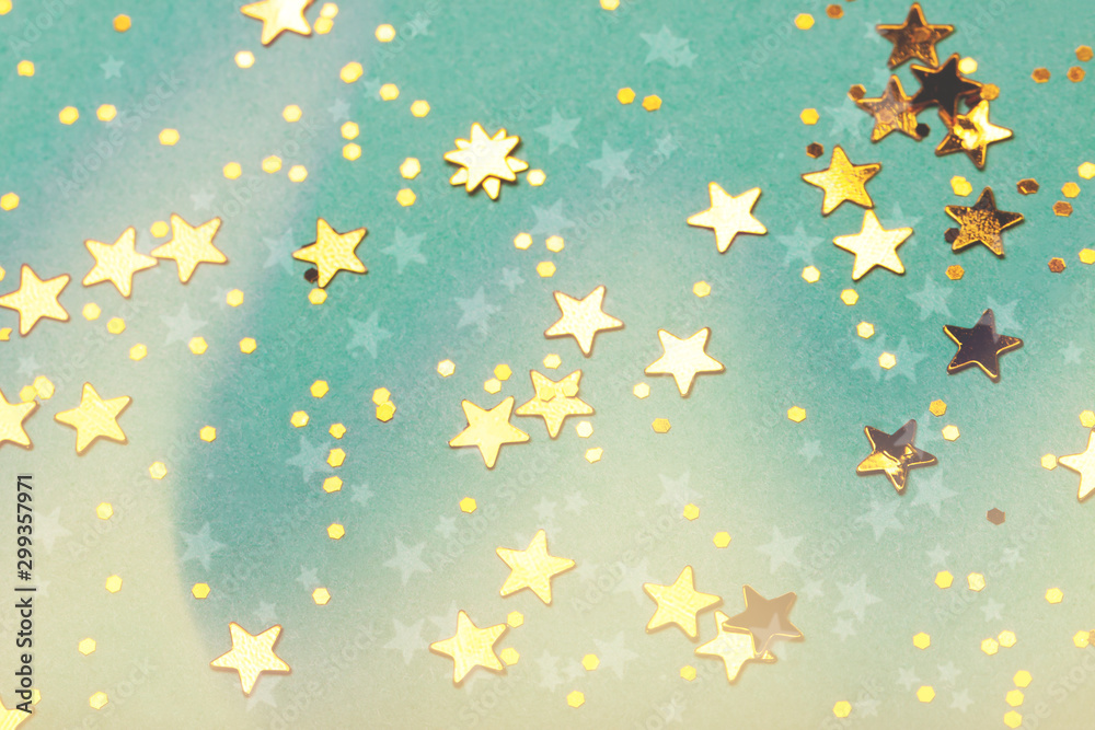 Trendy mint background with golden stars. The concept of celebrations, the Day of St. Valentine, Christmas, New Year, holiday, birthday, etc.