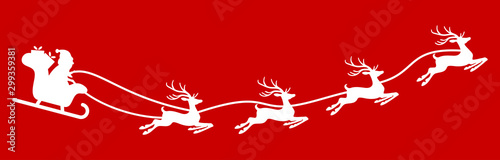 Santa Claus with sled and reindeers