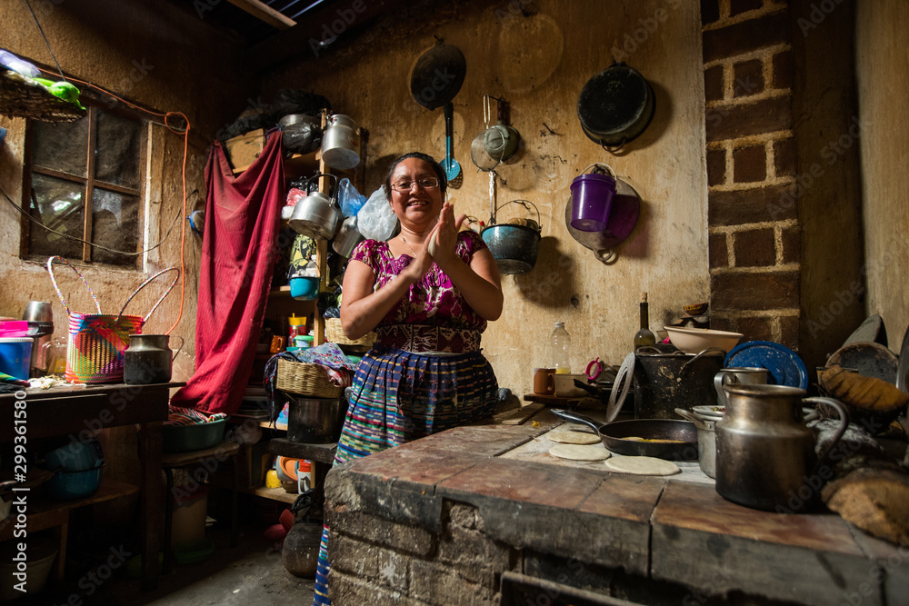 Guatemalan woman makint tortillas in San Juan La Laguna, Lake Atitlan, Guatemala