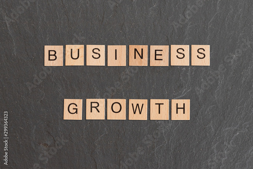 business growth written with game tiles © James