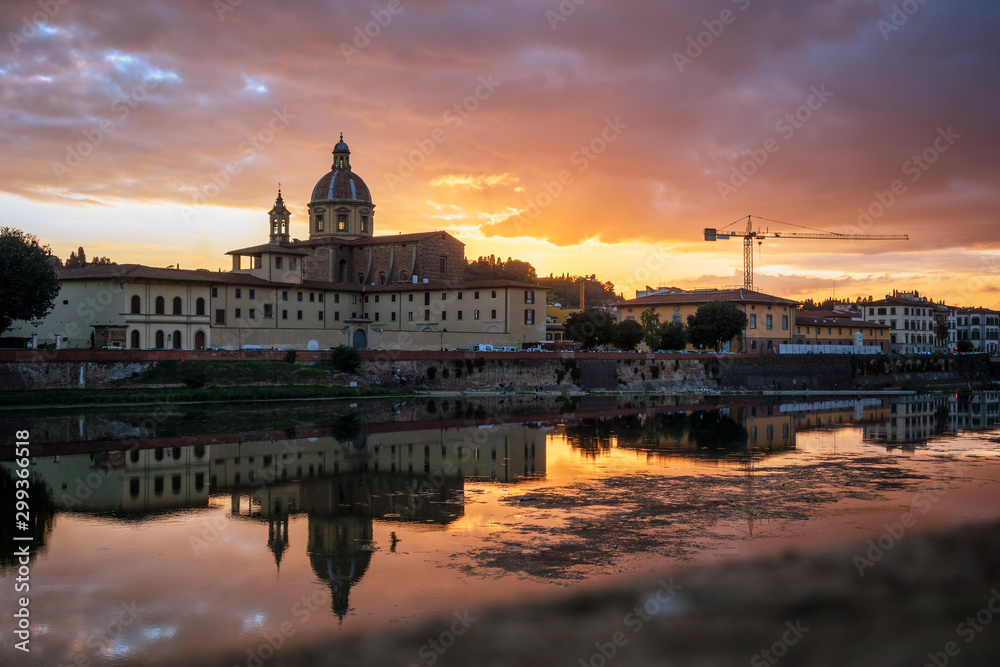 FLORENCE, TUSCANY/ITALY - OCTOBER 19 : View of buildings along the River Arno at dusk  in Florence  on October 19, 2019