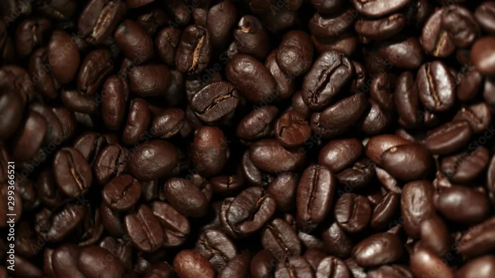 Super slow motion of rotating coffee beans in mill, speed ramping cut. Filmed on high speed cinema camera, 1000 fps. Super slow motion of rotating coffee beans in mill, speed ramping cut. Filmed on high speed cinema camera, 1000 fps.