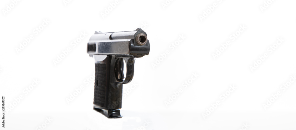 Handgun isolated against white background, closeup view