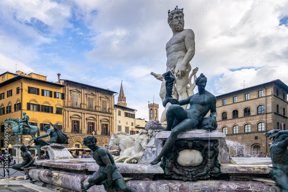 FLORENCE, TUSCANY/ITALY - OCTOBER 19 : Detail from the Fountain of Neptune statue Piazza della Signoria in front of the Palazzo Vecchio Florence on October 19, 2019