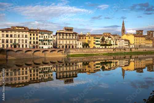 FLORENCE, TUSCANY/ITALY - OCTOBER 18 : View of buildings along and across the River Arno in Florence on October 18, 2019. Unidentified people.