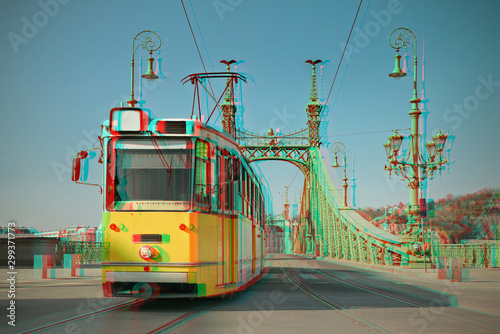 Historic tram on Freedom Bridge in Budapest, toned image, glitch anaglyph effect