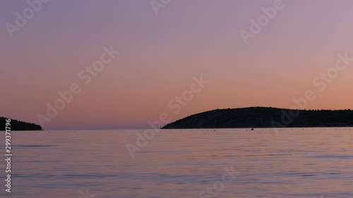 Enjoy a peaceful evening with a beautiful sunset at the croatian beach of Šibenik.