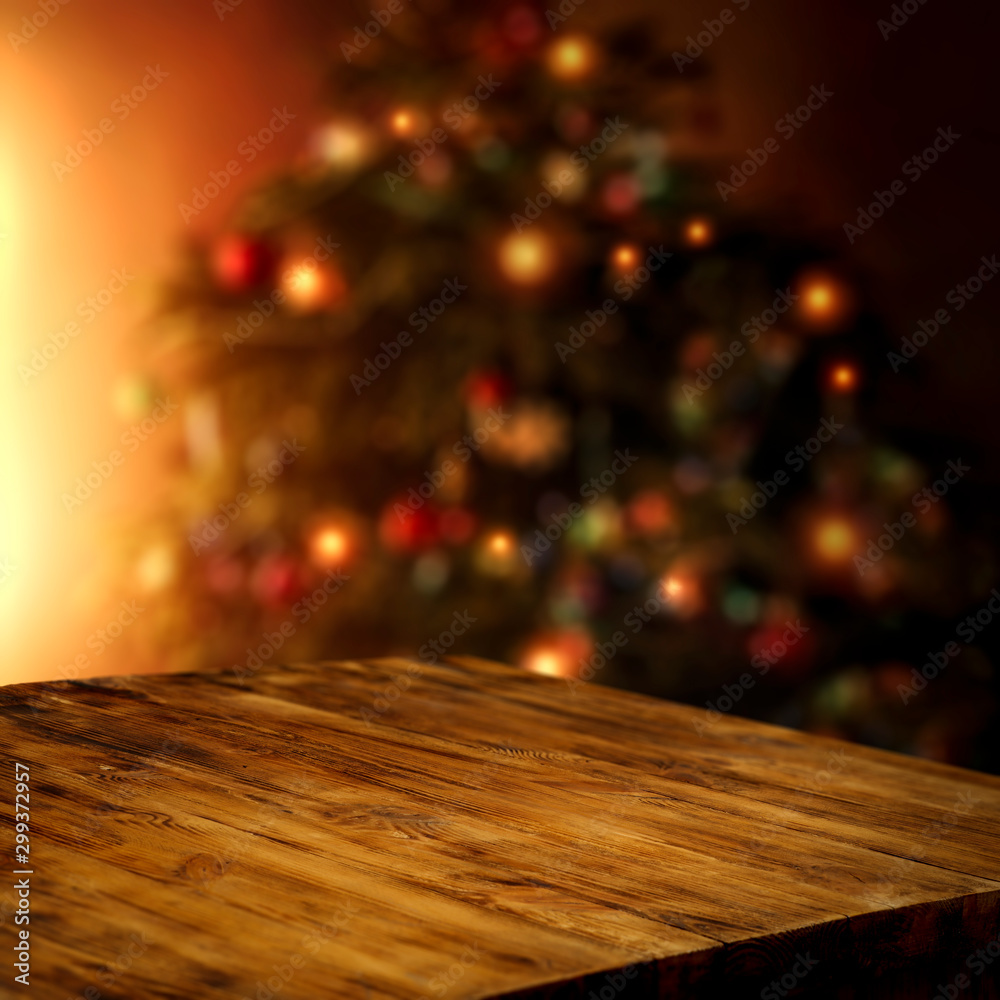 Wooden corner table of free space for your decoration and blurred christmas tree Wooden corner table of free space for your decoration and blurred christmas tree