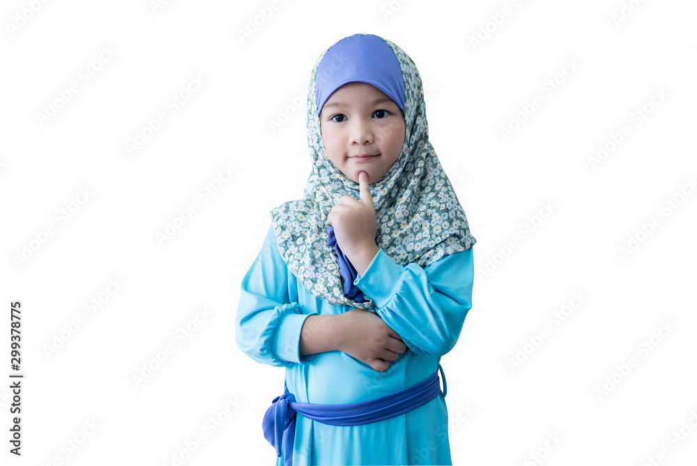Portrait images of A 6 year old Asian girl wearing blue Islamic dress, Showing gestures using though On white isolated background, to children oncept. Portrait images of A 6 year old Asian girl wearing blue Islamic dress, Showing gestures using though On white isolated background, to children oncept.