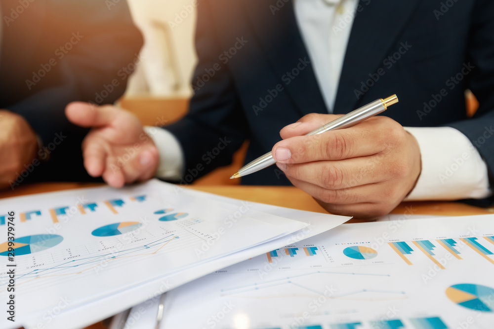 Business team meeting and discussing project plan. Businessmen discussing together in meeting room. Professional investor working with business project together. Business team meeting and discussing project plan. Businessmen discussing together in meeting room. Professional investor working with business project together.