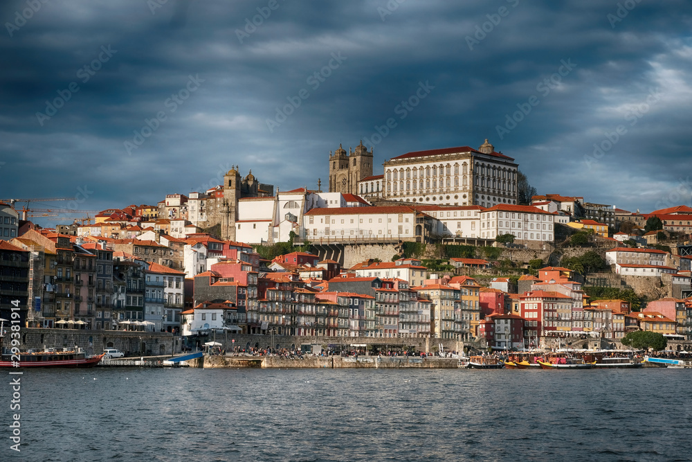 Porto city, Portugal, Panoramic view of the historic center on a hill from the Douro River Embankment