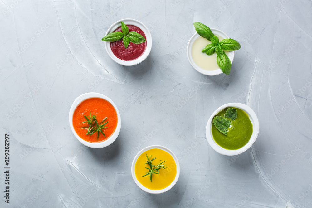 Set of seasonal fall autumn creamy soups on a table