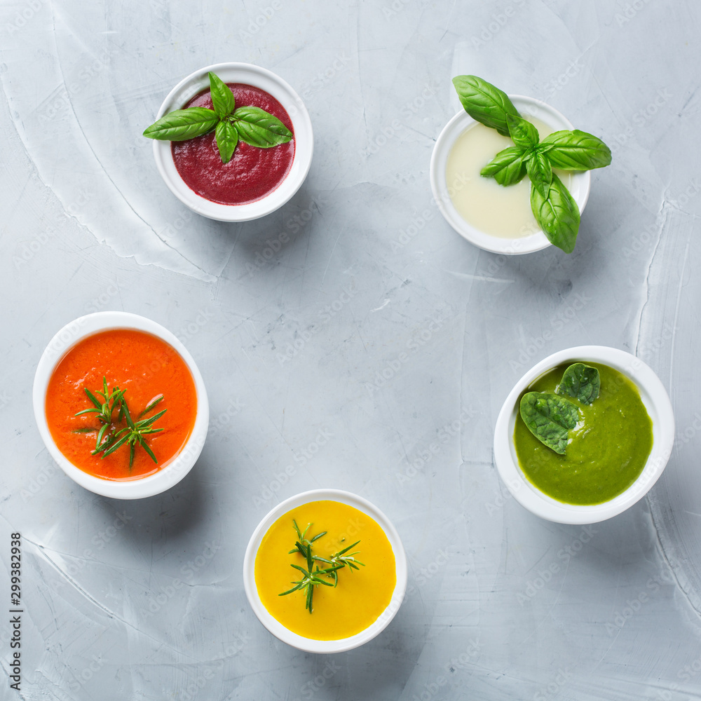 Set of seasonal fall autumn creamy soups on a table Set of seasonal fall autumn creamy soups on a table