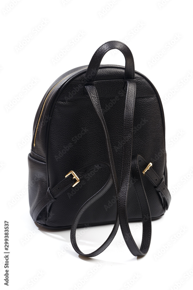 leather backpack with staves standing on a white background - Image leather backpack with staves standing on a white background - Image