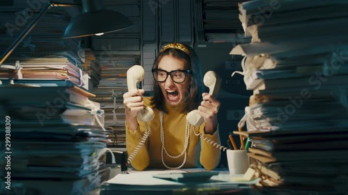 Nervous office worker shouting at customers on the phone