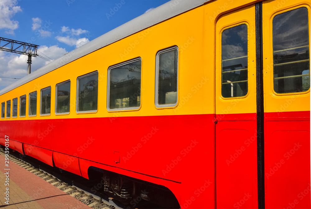 red-orange train carriage