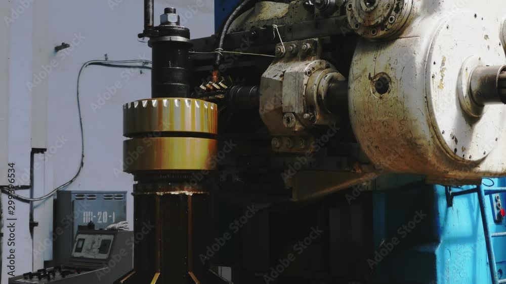 Rolling forming rolls metal works. Rolling mill machine for rolling steel sheet. Mill machine with oil close up. Rolling mill preparation workshop. Machining of machine parts. Rolling forming rolls metal works. Rolling mill machine for rolling steel sheet. Mill machine with oil close up. Rolling mill preparation workshop. Machining of machine parts.