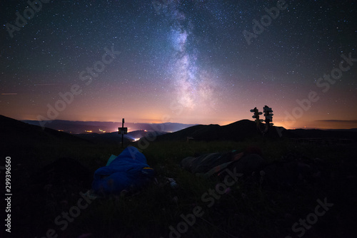 Sleeping Under The Stars, Men In A Sleeping Bag And Shining Milky Way Above Their Heads, Million Stars Hotel
