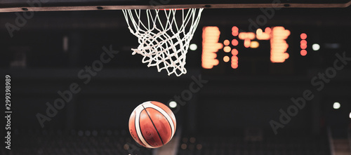 scoring during a basketball game ball in hoop © Melinda Nagy