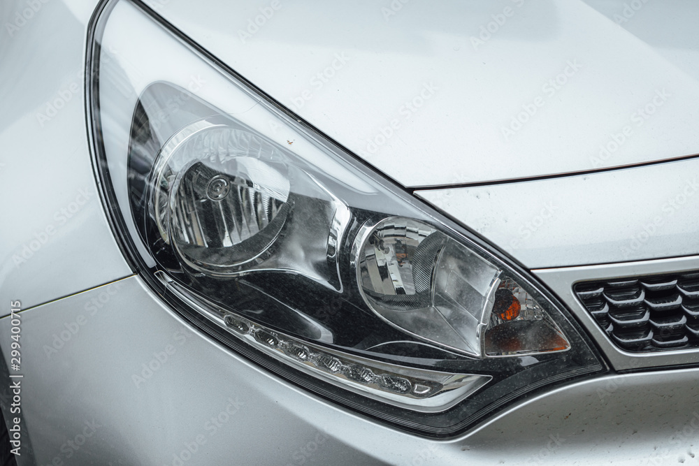 Car Headlight lamp in close up. Modern transport