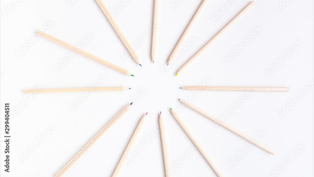 Stop motion animation flat lay of a group of wooden pencils that converge in a small circle. Education concept Stop motion animation flat lay of a group of wooden pencils that converge in a small circle. Education concept