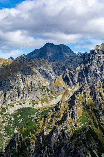 Autumn view of the mountain landscape in the High Tatras in Slovakia. Ice Peak (Ladovy stit, Lodowy Szczyt) dominating over them the peaks. photo
