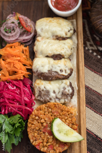 Middle Eastern Style Kofte Meatballs with Melted Cheese and Condiments, Kofte Kebab