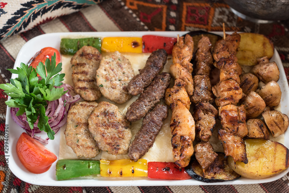 Middle Eastern Style Assorted Grilled Meat, Kebabs, Beef, Lamb, Chicken and Vegetables.