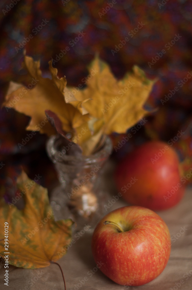 autumn still life with apples and leaves autumn still life with apples and leaves