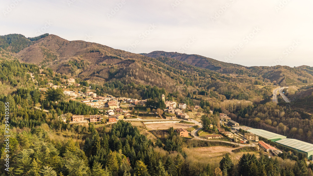 Aerial view of Espinelves cityscape surrounding by woods, Girona, Spain. Aerial view of Espinelves cityscape surrounding by woods, Girona, Spain.