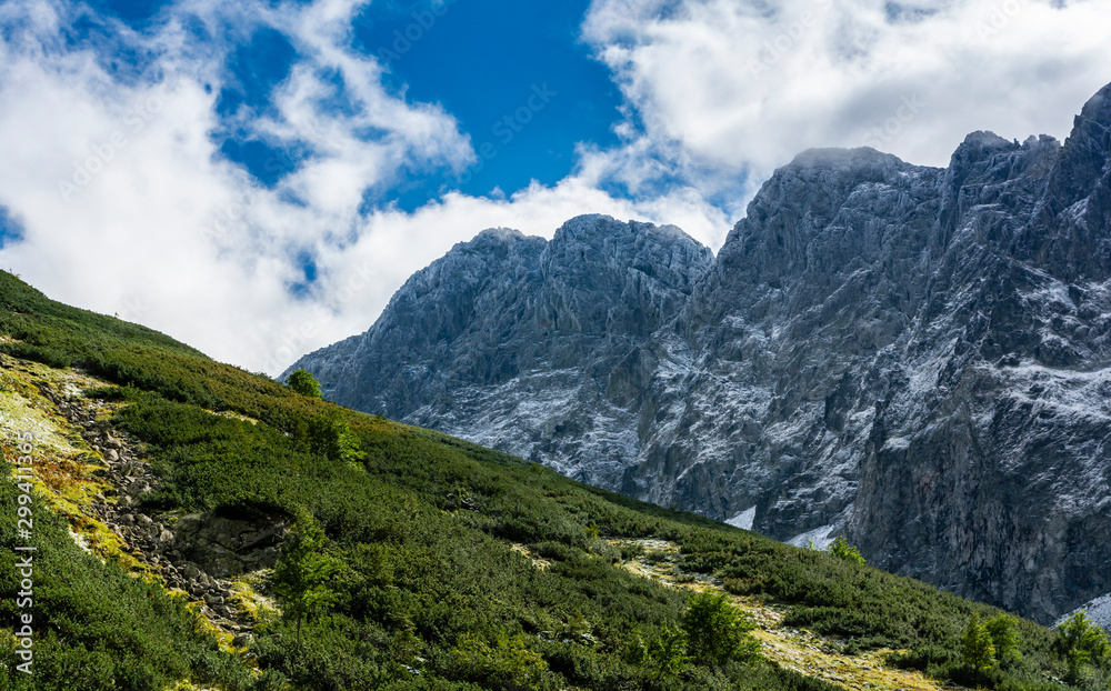 High northern walls of the peaks (Javorovy stit - Jaworowy Szczyt, Maly Javorovy stit - Maly Jaworowy Szczyt) in the first ice and frost at the beginning of autumn. Tatra Mountains, Slovakia. High northern walls of the peaks (Javorovy stit - Jaworowy Szczyt, Maly Javorovy stit - Maly Jaworowy Szczyt) in the first ice and frost at the beginning of autumn. Tatra Mountains, Slovakia.