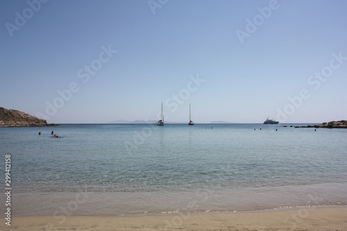 Aegean sea: sand, water, ripples, reflections, waves and lighthouses © Michael