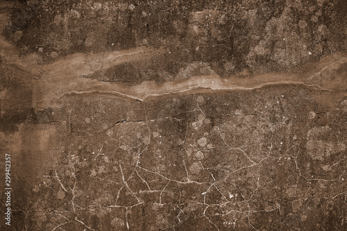 decorative brown grunge concrete texture with cracks background
