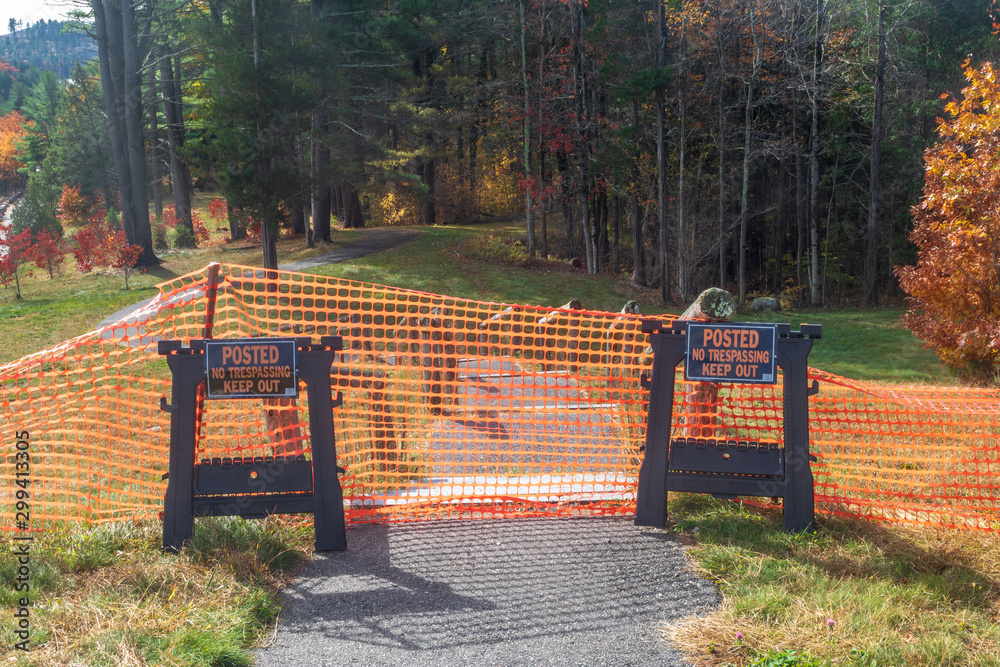 No trespassing signs blocking a path into the woods Stock Photo | Adobe ...