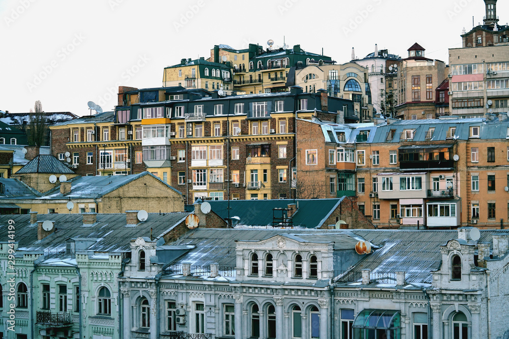 Downtown with urban housing and old patrician houses in winter in the daytime, Ukraine, Kiev, Bessarabskaya Square