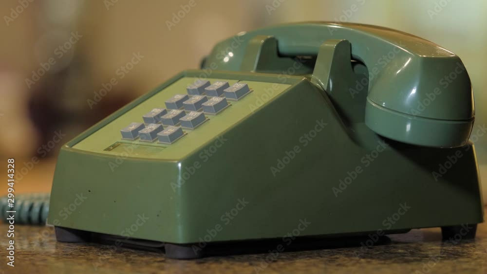 Retro push button rotary dial telephone ringing. phone call on
