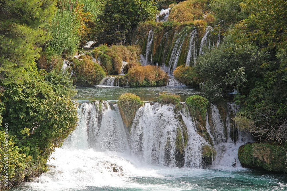 Obraz premium Beautiful Skradinski Buk Waterfall In Krka National Park in early autumn, famous travel destination in Dalmatia of Croatia. Europe.