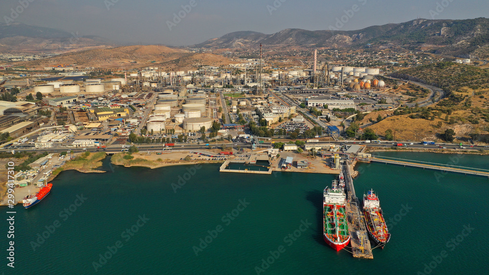 Obraz premium Aerial drone photo of industrial refinery of Hellenic Public Petroleum company in gulf of Aspropirgos, Attica, Greece