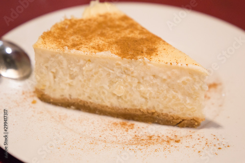 Portion of sweet cheese cake on plate Spain