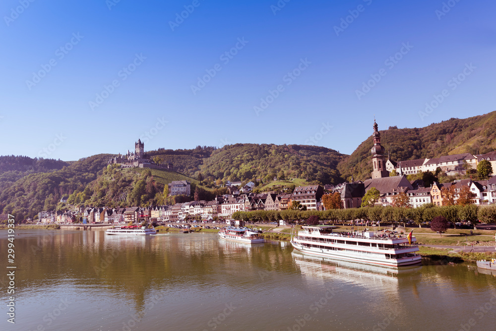 The beautiful Reichsburg Cochem (Cochem Imperial Castle) with village and the river Moselle in the foreground, Cochem, Rhineland-Palatinate, Germany, Europe